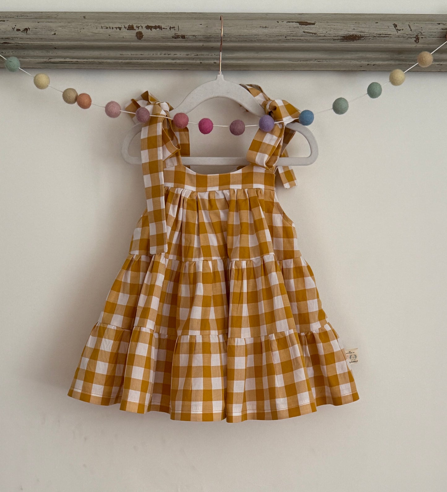 100% Cotton Gingham Mustard tiered dress with bow straps