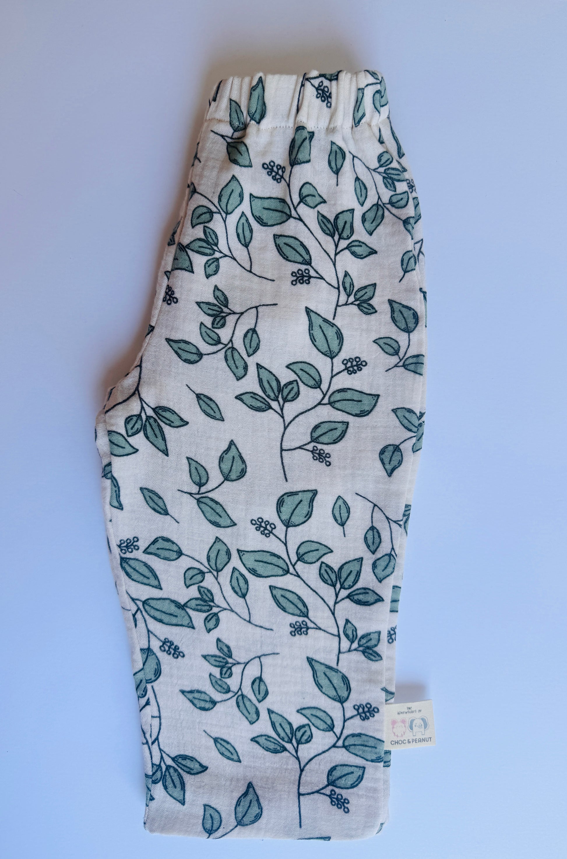 100% cotton muslin kids unisex trousers with leaf and vine detail