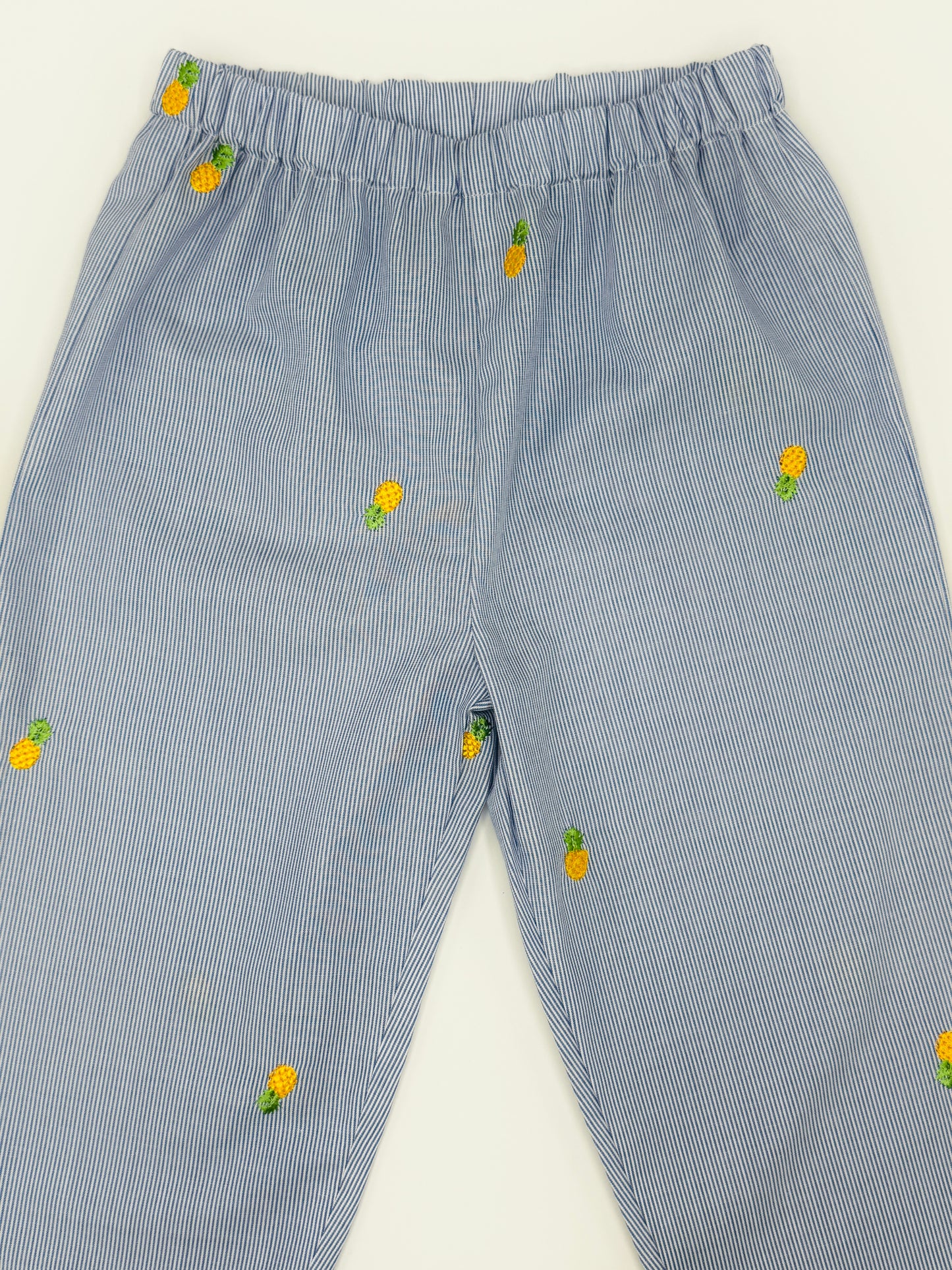 Sustainable cotton Unisex Kids pinstripe trousers with embroidered pineapples