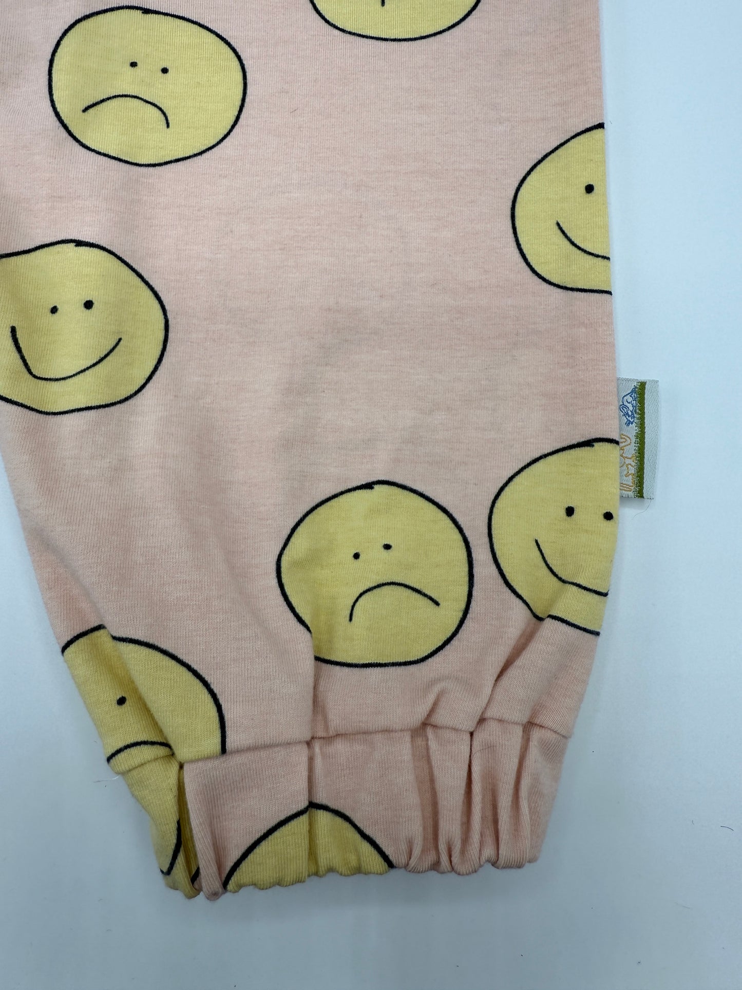 Pink sustainable Unisex Kids Sweatpants with happy/sad faces
