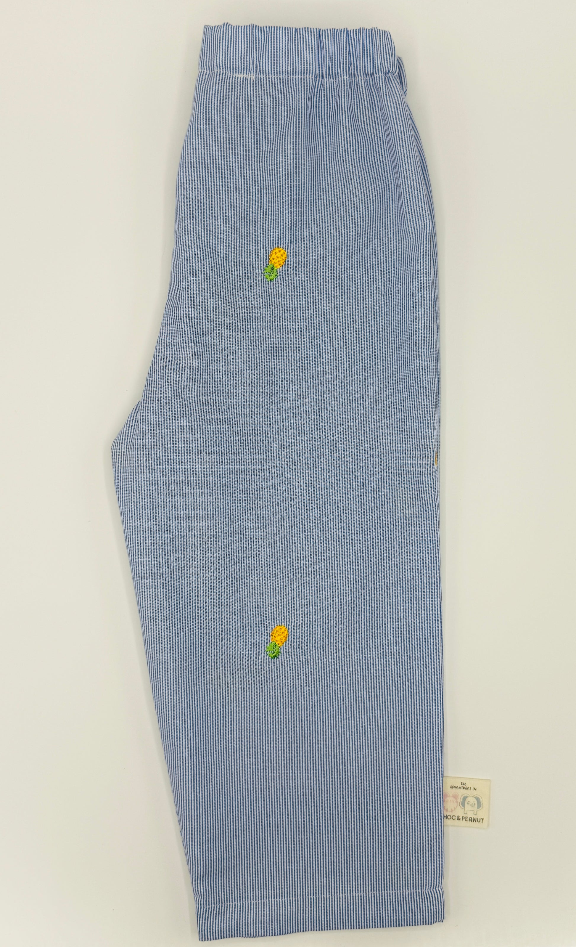 100% cotton Unisex kids blue pinstripe trouser with embroidered pineapple detail. Handmade 