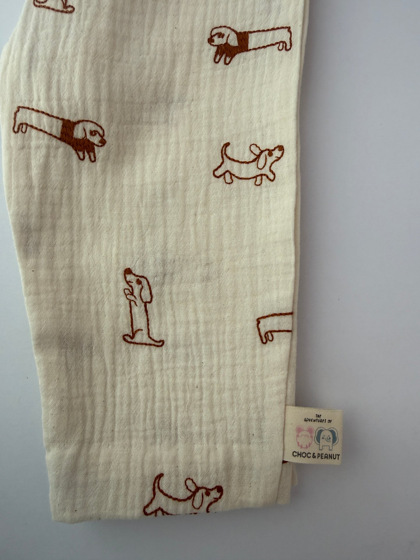 100% cotton muslin kids trousers with dog embroidered detail